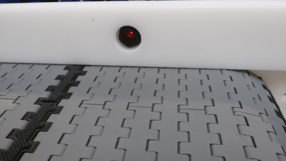 conveyor laser stop sensor