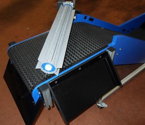 conveyor with plastic sprue separator